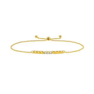 14K gold bracelet with a twisted bar and natural diamonds, featuring a delicate chain and adjustable drawstring closure for a perfect fit.