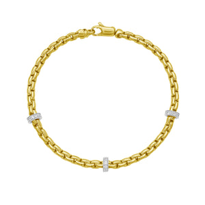 14K gold bracelet with Venetian links and three natural diamond rondels, designed to add elegance and charm to any moment.